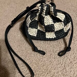 Elegant Black and Cream Checkered Mini Bag